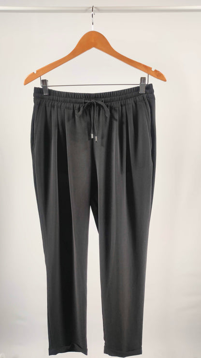 Pantalones holgados con bolsillos y cintura ajustable